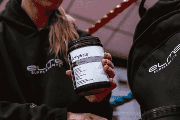 Athlete holding Dr Hydrate supplement